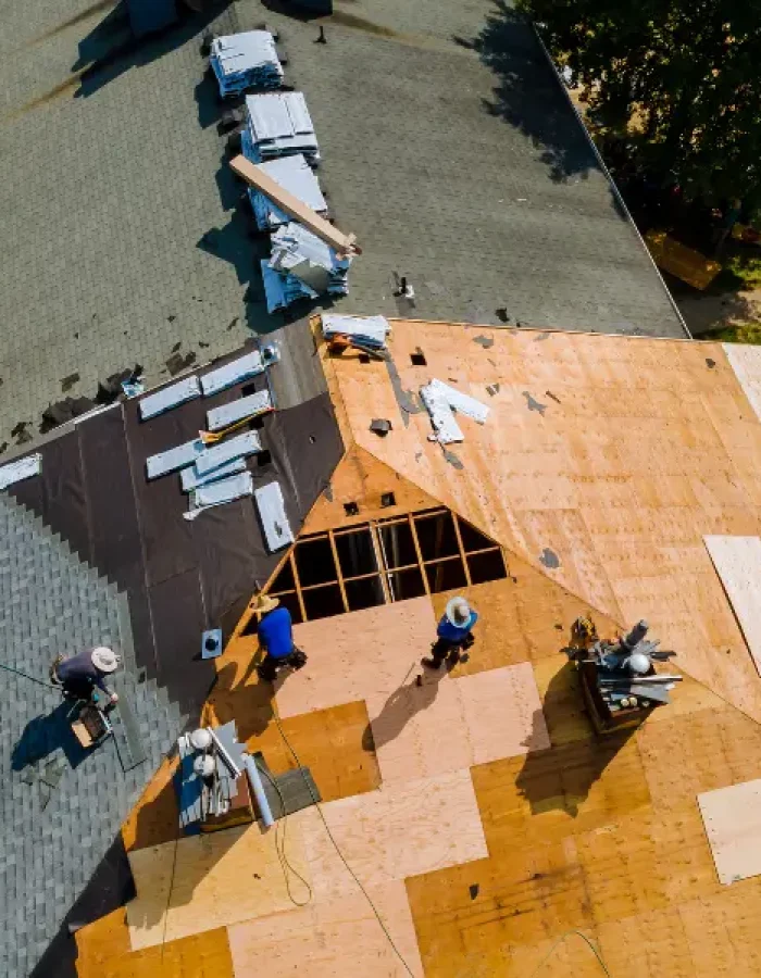 Aerial view of roof replacement with plywood sheathing